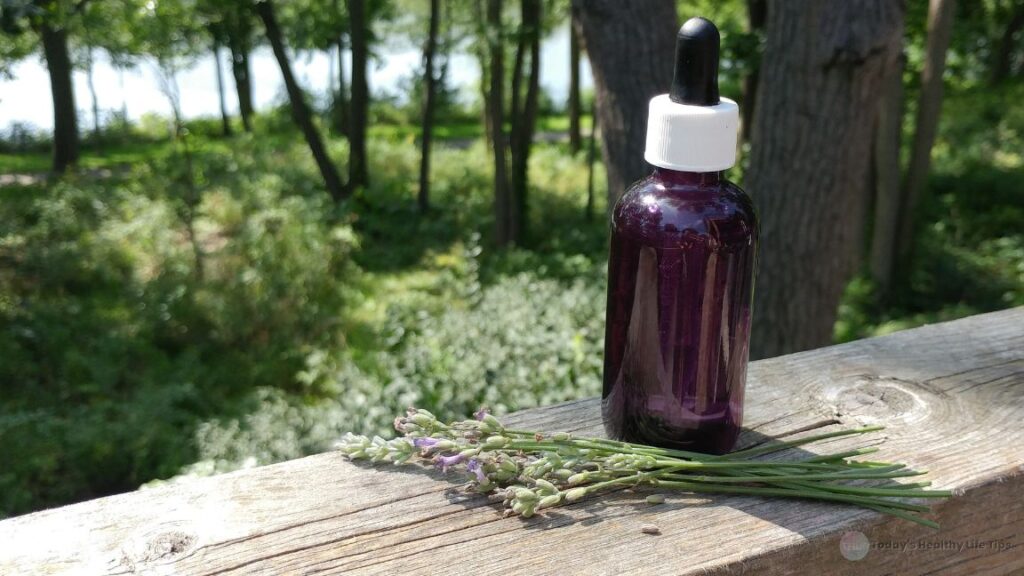 lavender essential oil with trees in the background. ProstaKnight.